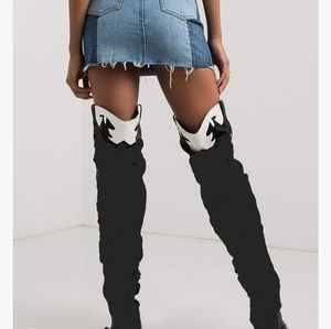 Thigh high cowboy boots
